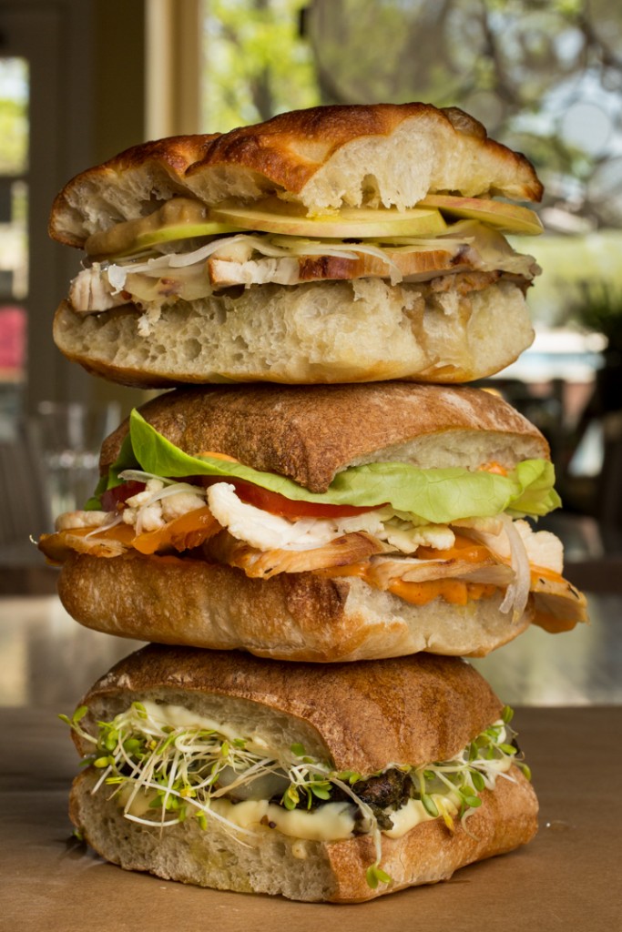 Sandwich pile-up; (TTB) Pork Sandwich, Turkey Sandwich, and Vegetarian Jerk Mushroom sandwich by Sassafras Bakery. Shot 05/07/15 at Sassafras Bakery in Worthington, Columbus for Alive Eat & Drink Feature. (Meghan Ralston)